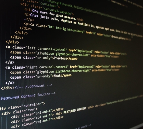 turned on computer monitor displaying text